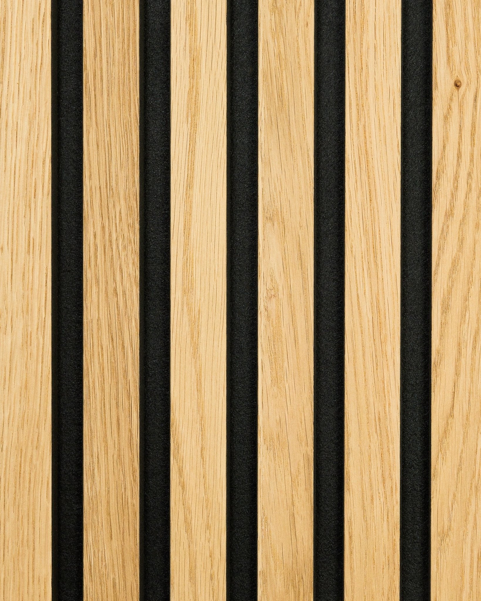 Close-up of WoodUpp Akupanel Rustic sample in Natural Oak, featuring alternating light wood slats and black acoustic grooves for sound absorption.